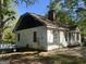 Back view of a charming one-story home with visible windows at 4582 Hendrix Dr, Forest Park, GA 30297