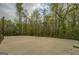Home basketball court surrounded by trees at 345 Phillips Dr, Fayetteville, GA 30214