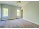 Sunny bedroom provides a relaxing atmosphere with large windows at 345 Phillips Dr, Fayetteville, GA 30214