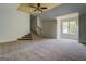 Expansive bonus room with stairs, natural light and high ceilings at 345 Phillips Dr, Fayetteville, GA 30214