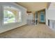 Spacious hallway features large windows and neutral carpeting at 345 Phillips Dr, Fayetteville, GA 30214