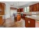 Gourmet kitchen with a center island, stainless steel appliances and hardwood floors at 345 Phillips Dr, Fayetteville, GA 30214