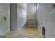 Bright laundry room featuring a utility sink, tile floors, and connections for a washer and dryer at 345 Phillips Dr, Fayetteville, GA 30214