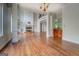Open living room with fireplace, built-in shelves and bar area at 345 Phillips Dr, Fayetteville, GA 30214