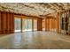 Unfinished basement featuring a walkout with large sliding glass doors at 345 Phillips Dr, Fayetteville, GA 30214