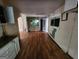 Dining Room with hardwood floors, archway, and built-in display cabinet at 30 Millwood Dr, Covington, GA 30016