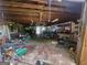 Spacious garage featuring exposed beams and ample storage space at 30 Millwood Dr, Covington, GA 30016
