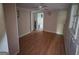 Neutral colored living room with wooden floors and a ceiling fan at 30 Millwood Dr, Covington, GA 30016