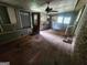 Empty sunroom with multiple windows and natural light at 30 Millwood Dr, Covington, GA 30016