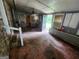 Sunroom with windows and an open door at 30 Millwood Dr, Covington, GA 30016