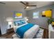 Bright bedroom with stylish ceiling fan, hardwood floors, contemporary furniture and decor accents at 1745 Rockbridge Nw Rd, Conyers, GA 30012