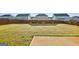 Large, meticulously maintained backyard featuring lush green grass and a privacy fence at 255 Orchid Dr, Mcdonough, GA 30252