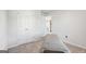 Neutral bedroom with closet and open doorway to a full bathroom at 255 Orchid Dr, Mcdonough, GA 30252