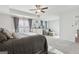 Expansive bedroom featuring sitting area with natural light and neutral colors throughout at 255 Orchid Dr, Mcdonough, GA 30252