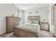 Cozy bedroom with carpet, light wood furniture, and bright, neutral walls at 255 Orchid Dr, Mcdonough, GA 30252