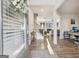 Bright and open foyer leading into a spacious home, showcasing hardwood floors and modern decor at 255 Orchid Dr, Mcdonough, GA 30252