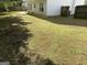 Spacious backyard with potential for landscaping and outdoor activities at 390 Hulan Way, Lawrenceville, GA 30044