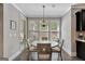 Cozy dining area with a round table and natural light at 185 Discovery Lake Dr, Fayetteville, GA 30215
