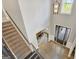 Grand foyer with high ceilings, hardwood floors, a staircase, and an elegant chandelier at 185 Discovery Lake Dr, Fayetteville, GA 30215
