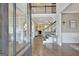 View of the foyer with hardwood floors, stairs and open layout to living spaces on the main floor at 185 Discovery Lake Dr, Fayetteville, GA 30215