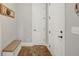 Hallway featuring a bench seat and a storage closet at 185 Discovery Lake Dr, Fayetteville, GA 30215