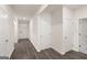 Bright hallway with multiple entryways, showcasing the home's functional layout at 1624 Palladian Way # 117, Lithonia, GA 30058