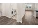 Convenient laundry area with modern washer and dryer adjacent to open living space at 1624 Palladian Way # 117, Lithonia, GA 30058