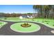 Aerial view of the community circle with lush landscaping and new homes at 1626 Palladian Way # 118, Lithonia, GA 30058