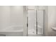 Bright bathroom showcases a soaking tub and a glass-enclosed shower stall at 1626 Palladian Way # 118, Lithonia, GA 30058