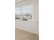 Bright bedroom with large windows, neutral carpet, and fresh, white walls offers a calming retreat at 1626 Palladian Way # 118, Lithonia, GA 30058