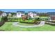 Community playground featuring slides, climbing structures, and a fenced-in area surrounded by lush landscaping at 1626 Palladian Way # 118, Lithonia, GA 30058