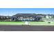Community pool house with an outdoor gathering area overlooking the pool at 1626 Palladian Way # 118, Lithonia, GA 30058