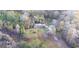 A sprawling property surrounded by lush greenery, offering privacy and seclusion at 98 Almon Church Rd, Covington, GA 30014