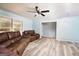 Spacious living room featuring modern wood-look flooring and lots of natural light at 98 Almon Church Rd, Covington, GA 30014