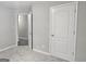 Bedroom features a closet and a door to another room at 28 Willow Ridge Dr, Hampton, GA 30228