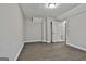 A bedroom featuring hardwood floors, neutral paint, a large closet and great natural light at 28 Willow Ridge Dr, Hampton, GA 30228