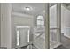 Welcoming foyer featuring a staircase, white trim, and a window for natural light at 28 Willow Ridge Dr, Hampton, GA 30228