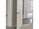 Hallway features multiple doors and neutral paint at 28 Willow Ridge Dr, Hampton, GA 30228