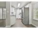 Bright kitchen with stainless steel appliances and granite countertops at 28 Willow Ridge Dr, Hampton, GA 30228