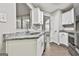 Updated kitchen with granite countertops and stainless steel appliances at 28 Willow Ridge Dr, Hampton, GA 30228
