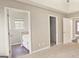 Spacious main bedroom with ensuite bathroom and walk-in closet at 28 Willow Ridge Dr, Hampton, GA 30228