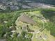 Aerial view of property boundaries, showcasing the expansive land, lake, and surrounding greenery at 39 Gabrielle Ct, Stockbridge, GA 30281