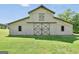 Spacious barn featuring sliding doors and light gray exterior at 39 Gabrielle Ct, Stockbridge, GA 30281