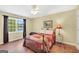 Charming bedroom with wood floors, ceiling fan, a view and natural light at 39 Gabrielle Ct, Stockbridge, GA 30281