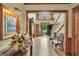 Inviting foyer with hardwood floors, staircase, and views to the backyard at 39 Gabrielle Ct, Stockbridge, GA 30281