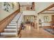 Elegant foyer with hardwood floors, staircase to the second level, and views into other rooms at 39 Gabrielle Ct, Stockbridge, GA 30281