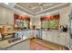 Bright kitchen featuring granite counters, stainless appliances, and eat-in space at 39 Gabrielle Ct, Stockbridge, GA 30281