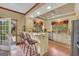 Well-appointed kitchen with granite countertops, stainless steel appliances, and breakfast bar at 39 Gabrielle Ct, Stockbridge, GA 30281