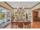 Open kitchen/dining area with French doors, granite counters, and stainless steel appliances at 39 Gabrielle Ct, Stockbridge, GA 30281
