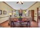 Cozy living room showcasing hardwood floors, a fireplace, and comfortable furnishings, creating a welcoming atmosphere at 39 Gabrielle Ct, Stockbridge, GA 30281